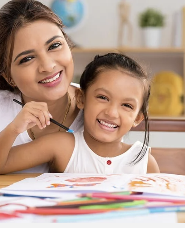 A therapist sharing a warm moment with a child